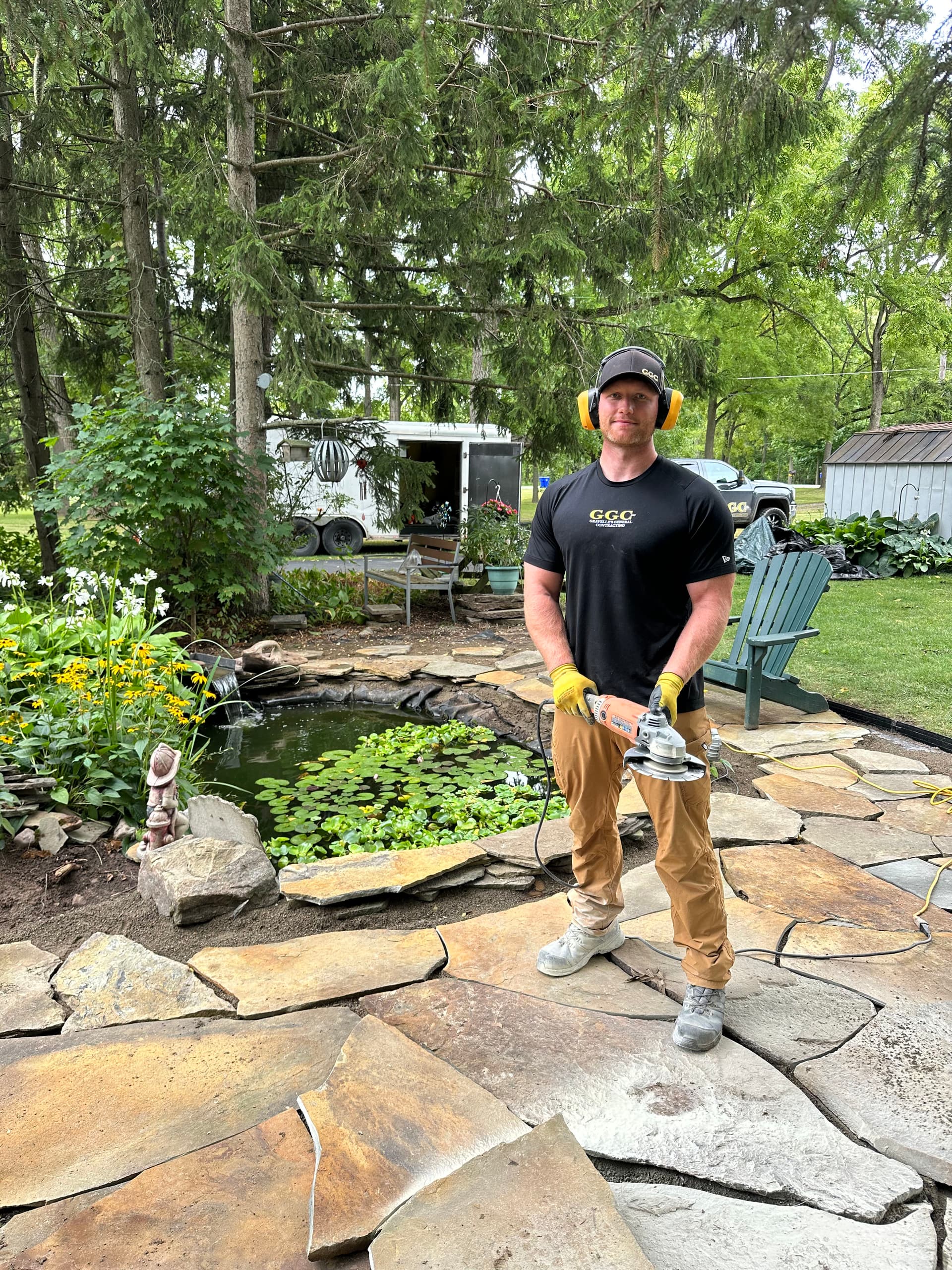 Stone Patio and Pond Transformation image