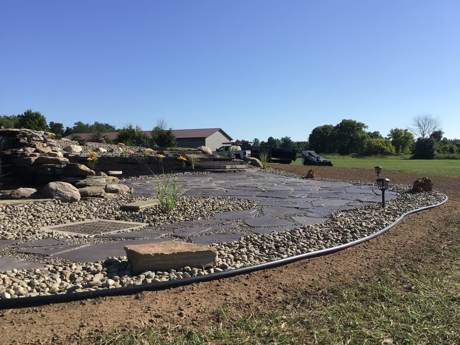 Gallery photos for Stunning Outdoor Spaces with Flagstone and Custom Landscaping: Image #1