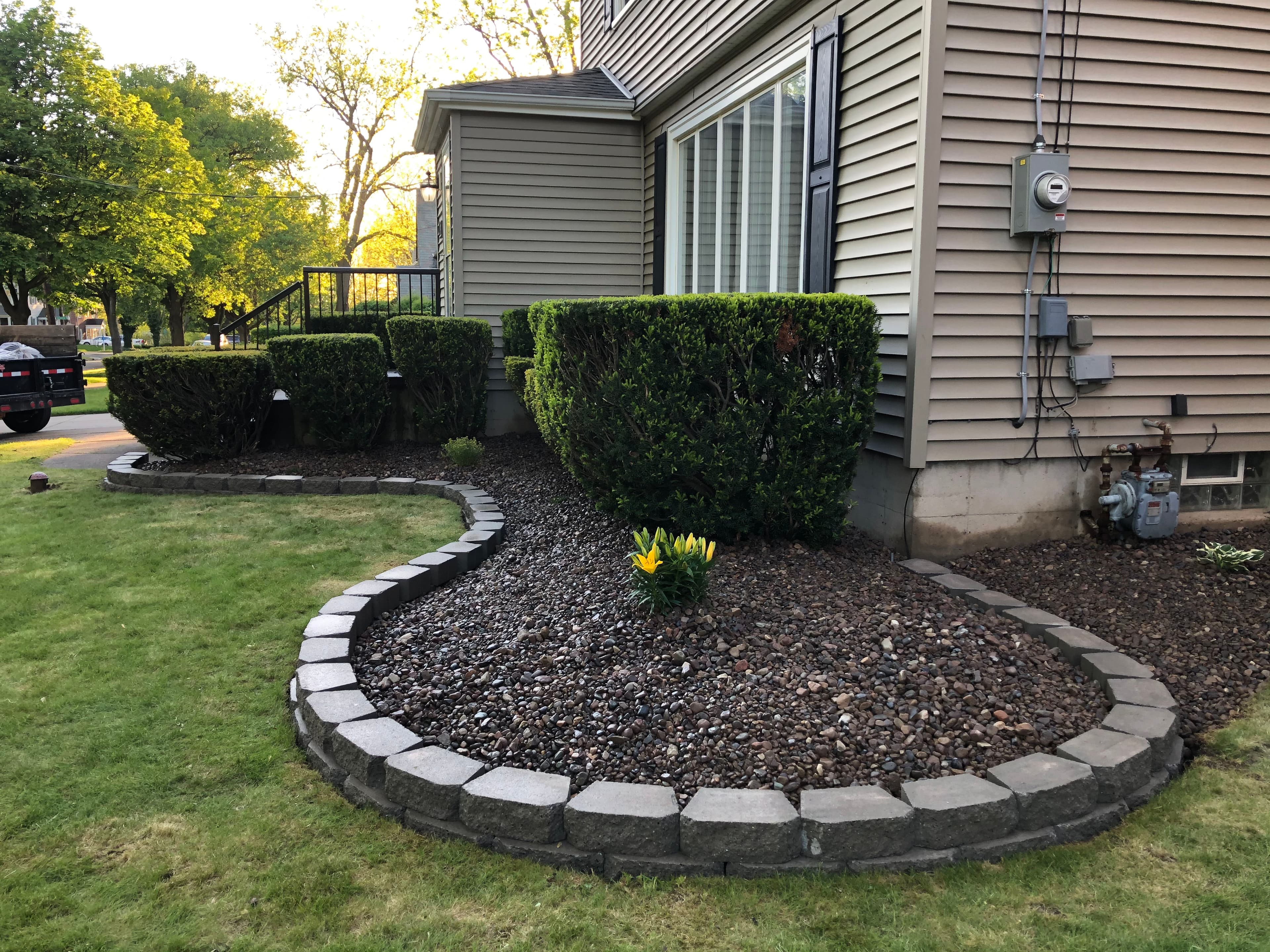 Project Transforming Yard Spaces with Decorative Stone Borders image