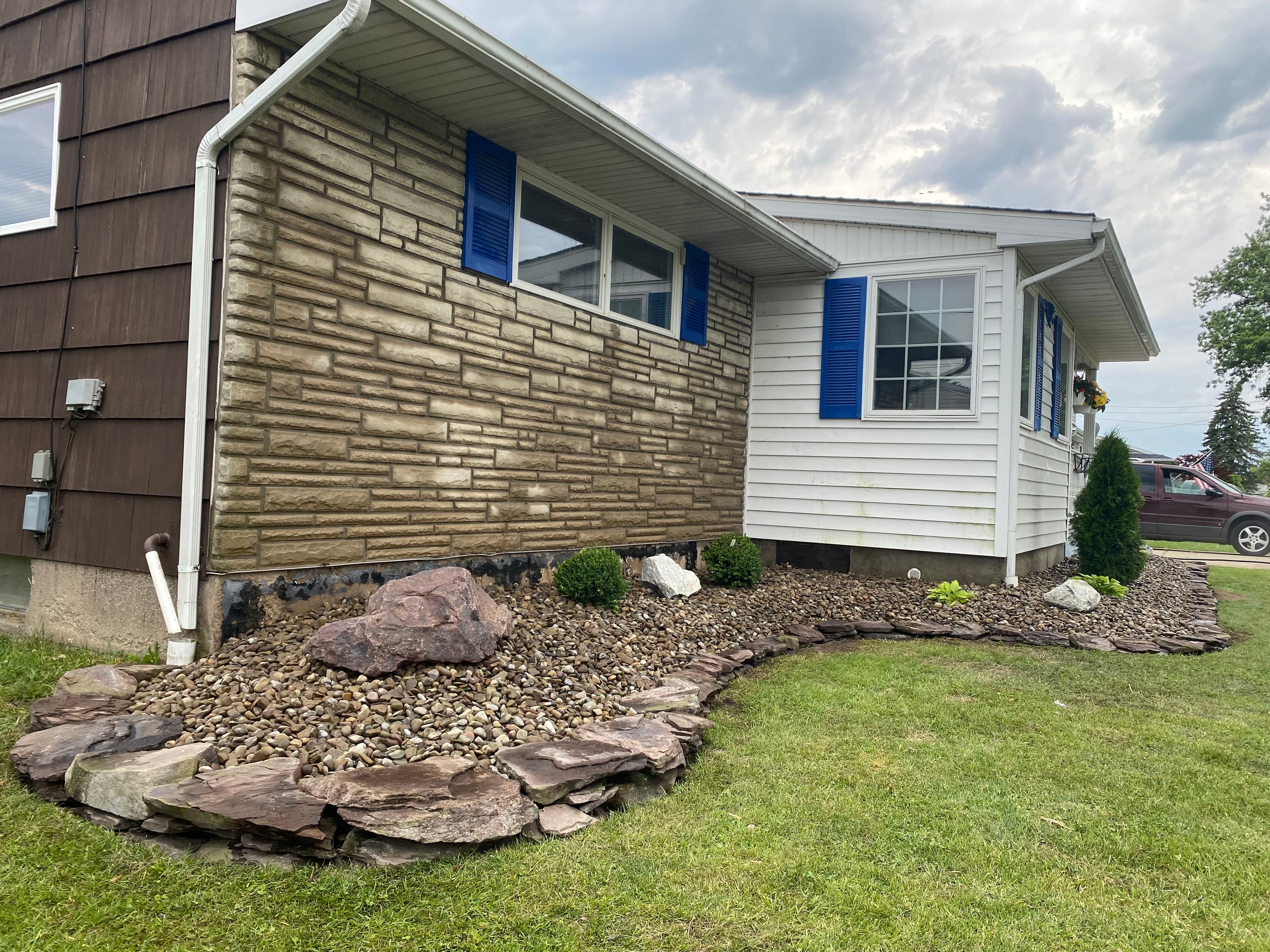 Project Enhancing Curb Appeal with Easy-Care Stone Beds image