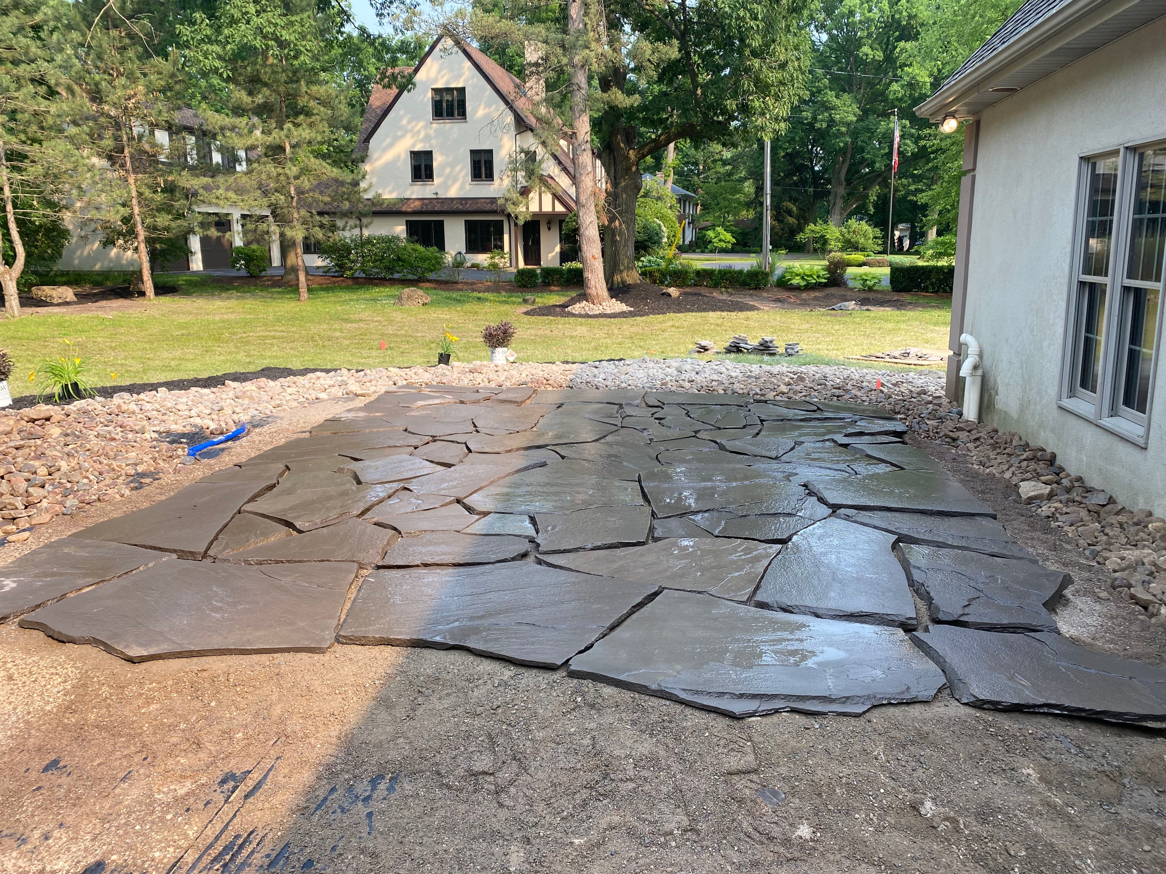 Project Artistry in Stone - A Stunning Flagstone Patio Creation image