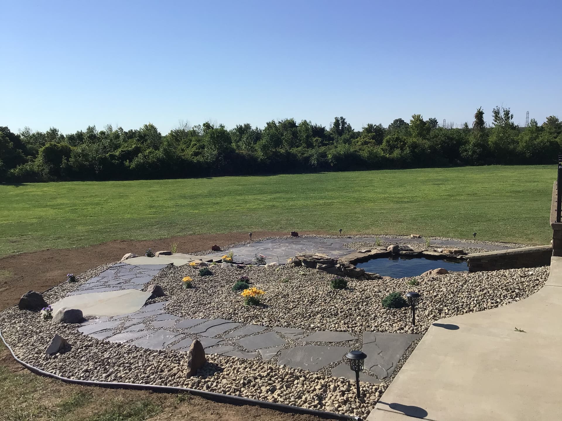 Gallery photos for Stunning Outdoor Spaces with Flagstone and Custom Landscaping: Image #7