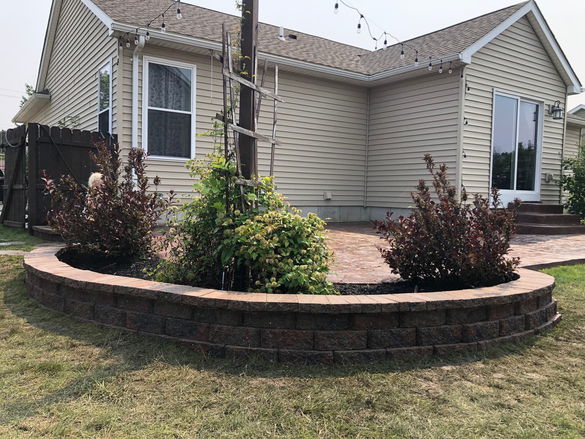 Gallery photos for Beautiful Backyard Enhancement with Retaining Walls and Patio: Image #3