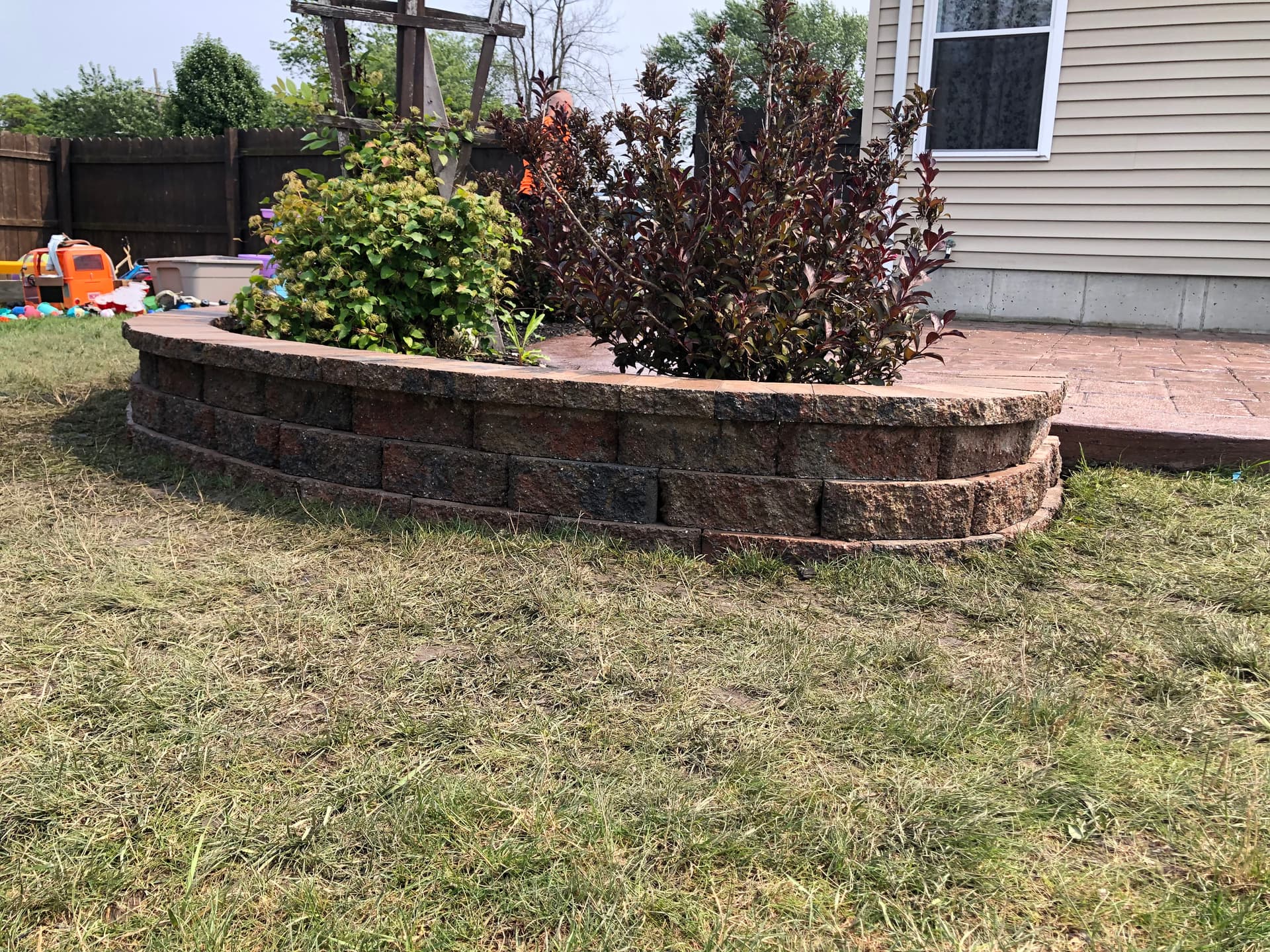 Gallery photos for Beautiful Backyard Enhancement with Retaining Walls and Patio: Image #4