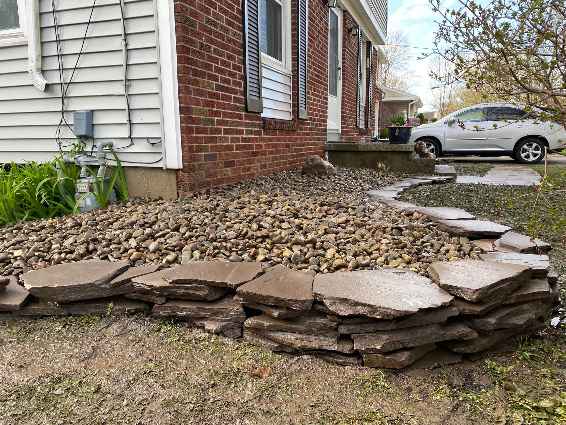 Elegant Stone Landscape Enhancement for Curb Appeal image