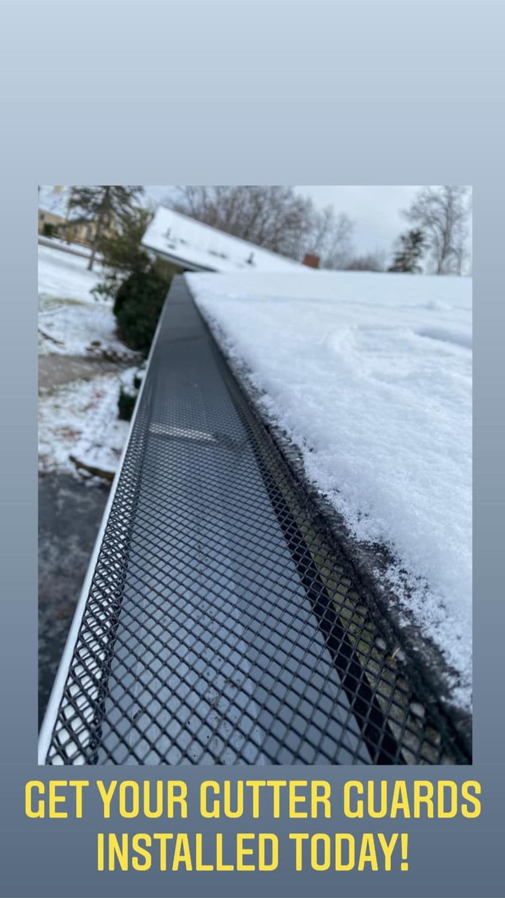 Gutter guard installation on snowy roof, promoting snow protection for homes.