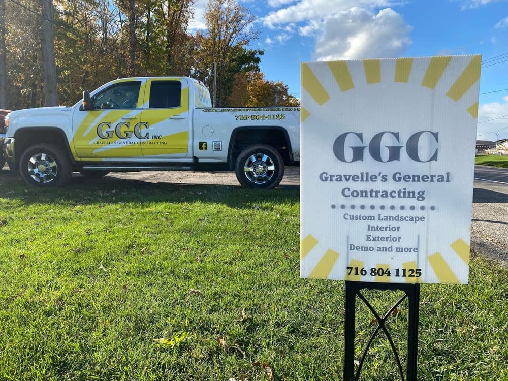 GGC sign and truck for Gravelle's General Contracting, offering landscape and interior services.
