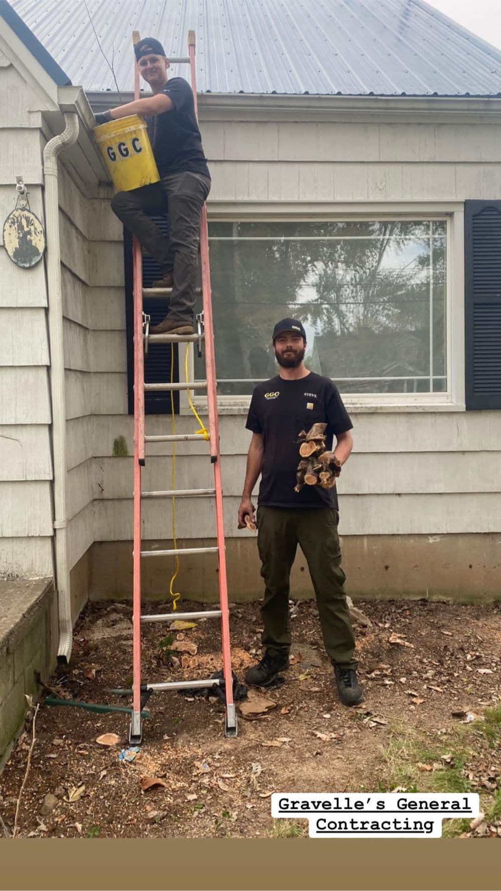 Two contractors from Gravelle's General Contracting working outdoors, one on a ladder holding a bucket.